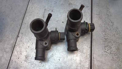 028121133B Фланец (тройник) системы охлаждения Volkswagen Polo 3 поколение 1995