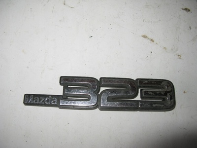 BJNNNXXX mazda 323 надпись логотип эмблема значек