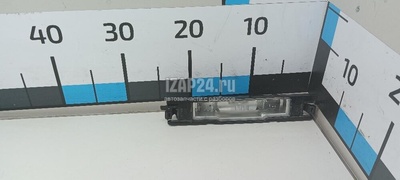 812710D010 Фонарь подсветки номера Toyota Yaris (1999 - 2005)