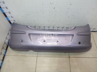 1404558 Бампер задний GM Corsa D (2006 - 2015)