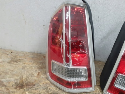 68154606AC chrysler 300c lancia thema фонарь сша левая