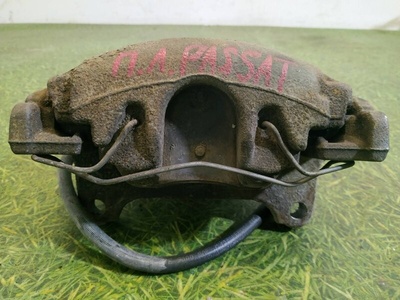 1K0615123E Суппорт тормозной Volkswagen Passat b7 2013