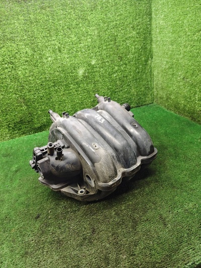 03E129711D коллектор выпускной Skoda Fabia (6Y) 2004