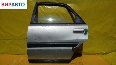 Стекло двери задней левой Mazda 323 BG (1989-1995) 1992