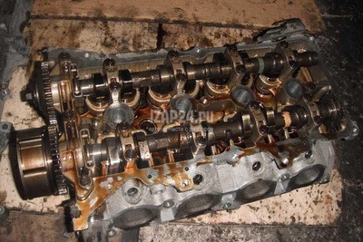 13020BC21A Распредвал выпускной Nissan Note (E11) (2006 - 2013)
