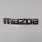 D65251710 Эмблема на крышку багажника Mazda Mazda 2 (DE) (2007 - 2014)