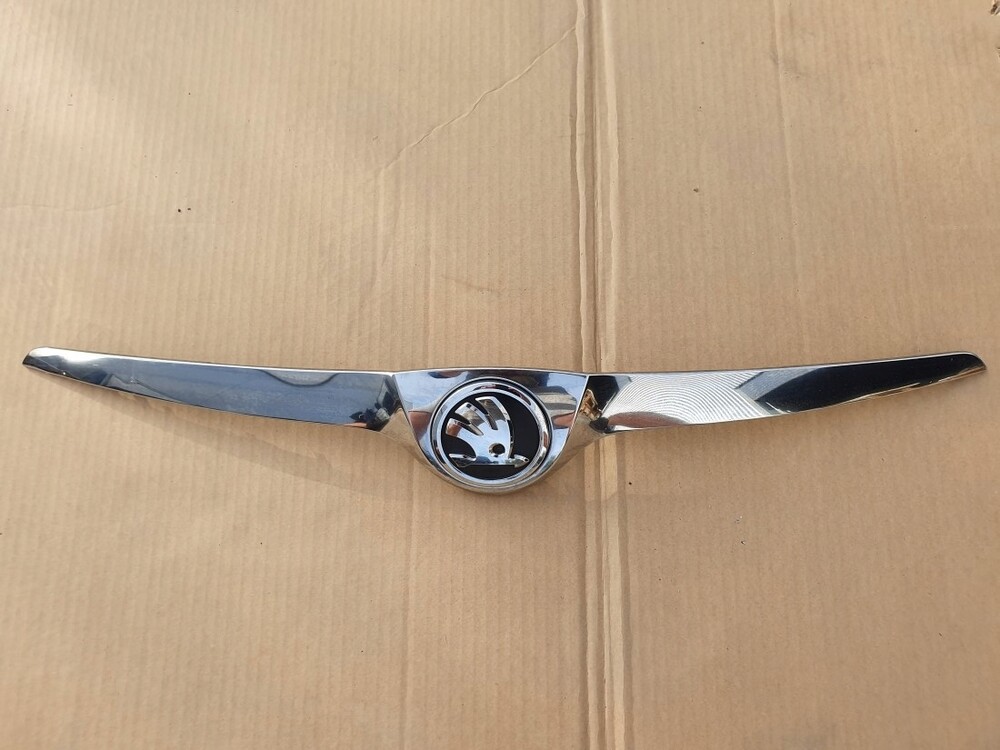 Эмблема шкода фабия 2 на капот