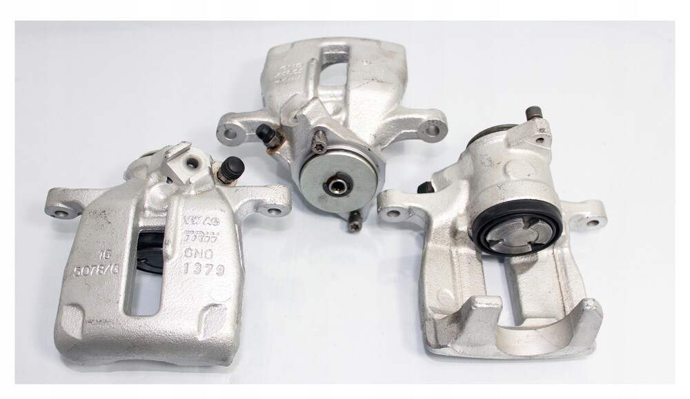 суппорт задний со скобой vw passat b3/4. задний спорт фольксваген пассат б3. суппорт задний passat b5. суппорт задний passat b5. суппорт задний passat b3.