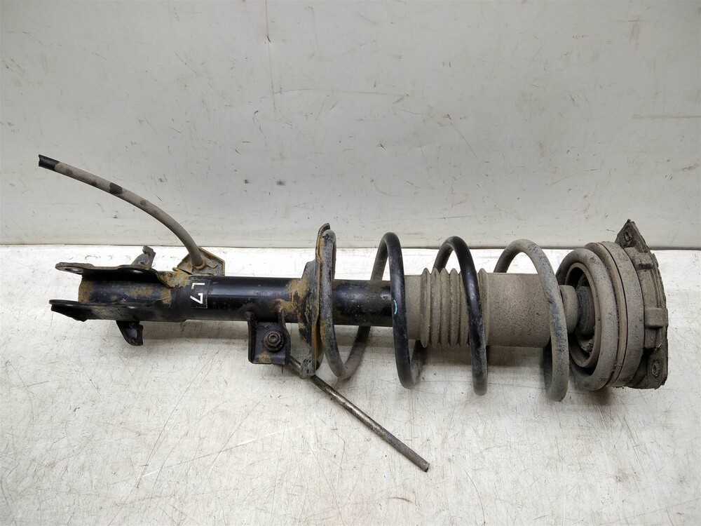 амортизатор задний tiida. амортизатор передний nissan tiida. 6 механика. купить стойки на ниссан тиида латио. Nissan e6210-1la7a амортизатор.