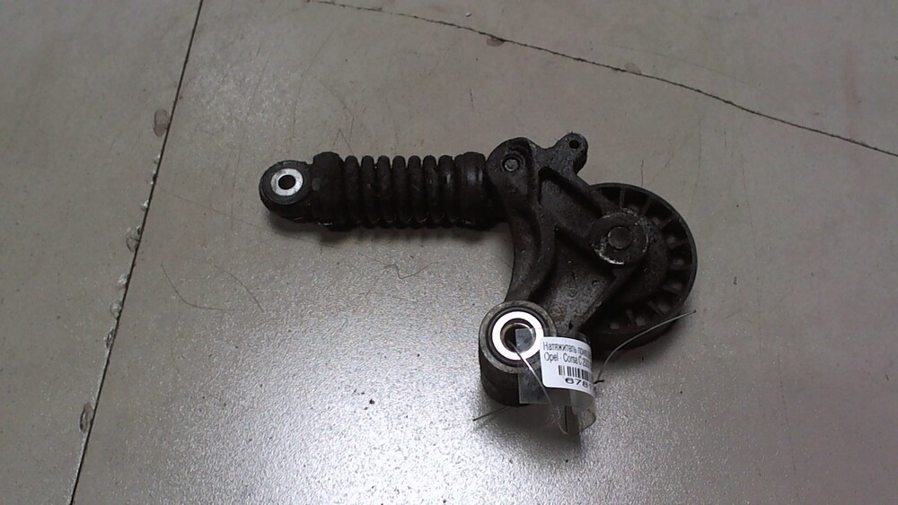 Натяжитель опель корса 1. Натяжной ролик opel corsa. 2. 55565005 фото. Натяжитель опель корса 1.