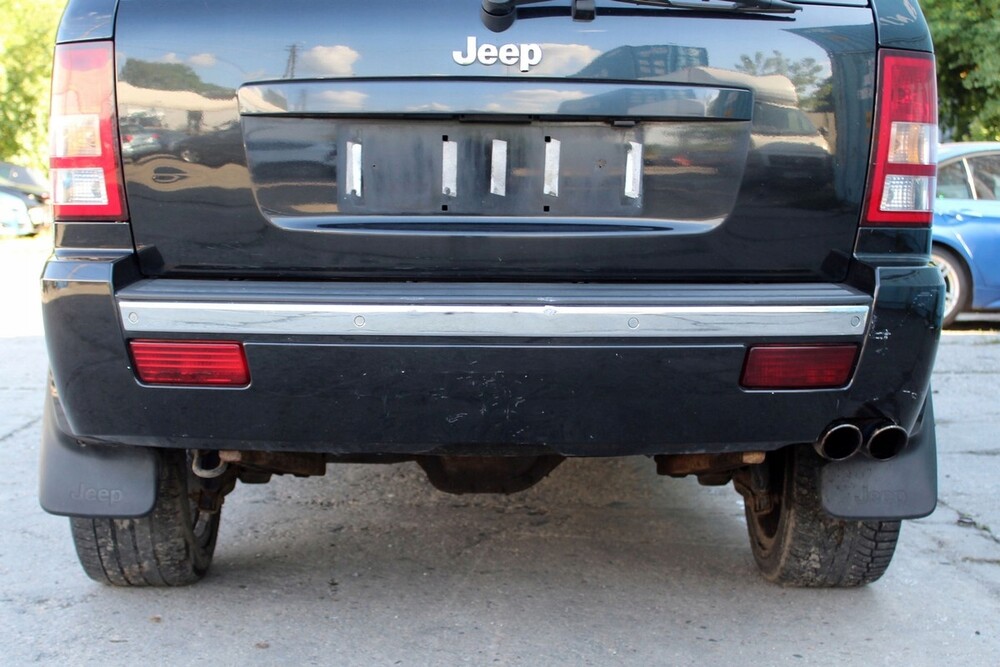 Гранд чероки задний. Задний бампер Гранд Чероки WH 2007. Jeep Grand Cherokee задний бампер. Задний бампер Jeep Grand Cherokee WK 1. Jeep Grand Cherokee 2005 без заднего бампера.