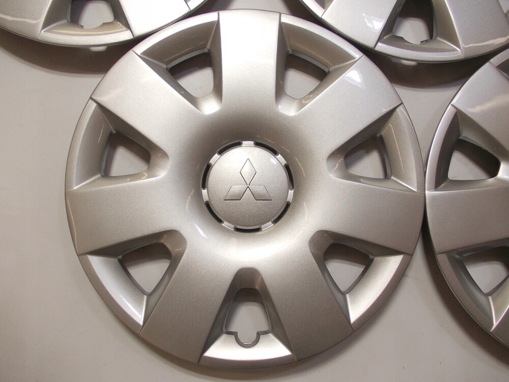 Колпак колеса митсубиси. Колпак колеса r17 ford 2071387. Ford 1683454 колпак колеса. Колпаки мицубиси. Колпак колеса митсубиси.