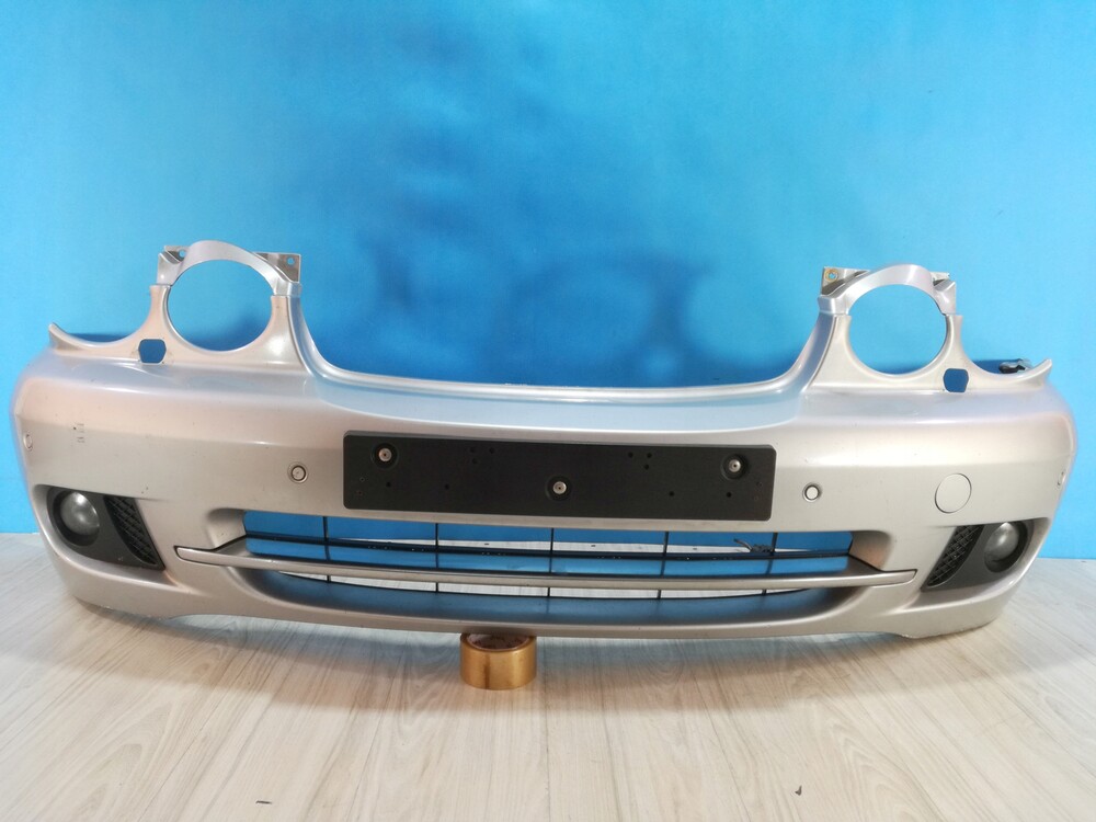 Fabia бампер передний оригинал артикул. Бампер рест. Митсубиши кольт бампер артикул. Бампер ягуар x-type. Бампер рестайлинг c23.