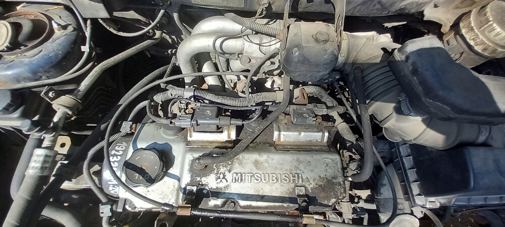 Mitsubishi с бензиновым двигателем. 6. Двигатель митсубиси 3. Mitsubishi gt 600. Моторный отсек митсубиси лансер.