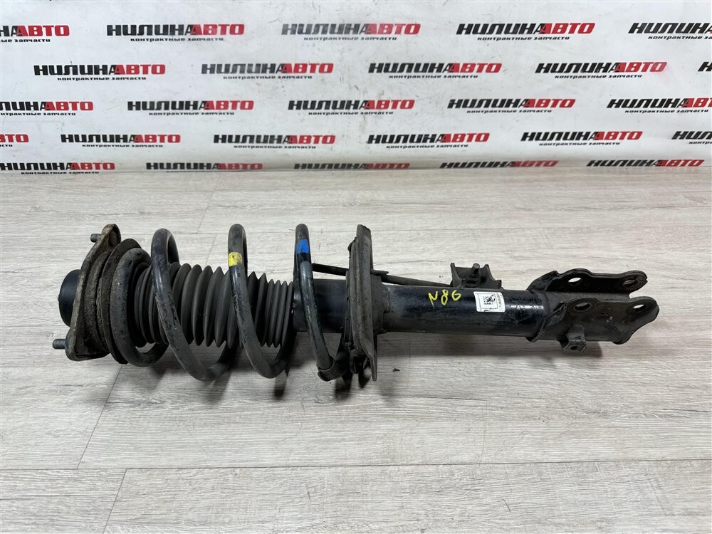 546613U520 KIA Sportage Амортизатор подвески стойка 