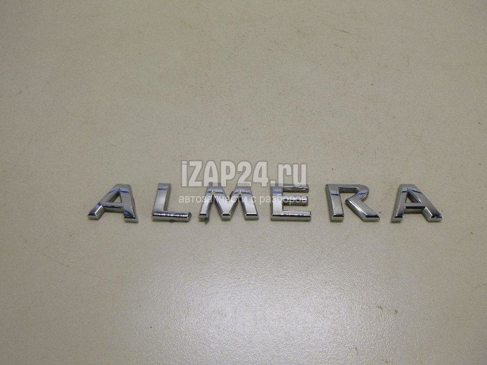 Альмера g15 крышка багажника. Шильдик Ниссан Альмера g15 артикул. Эмблема на Nissan Almera g15. Ниссан Almera n16 логотип надпись багажника артикул. Значок капота Ниссан Альмера g15.